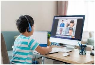 Students learning through an online homeschool program at home